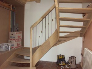 Start of a stair in ash built with veneered laminates